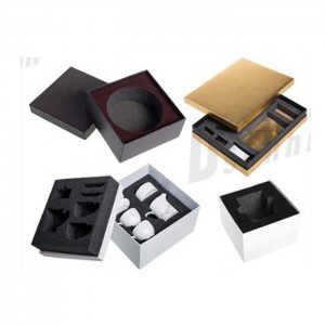 Packing strong cardboard box with EVA foam inserts